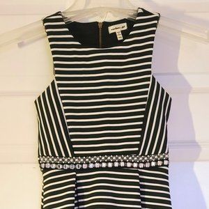 Big girls black and white striped dress with jewel accents (size 7/8 small)